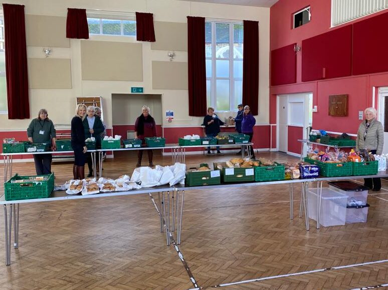 Foodsave Beer volunteers offering free food to the community from the Mariners’ Hall, Fore Street, Beer